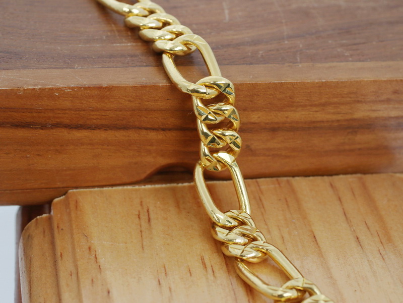 Figaro 23k gold bracelet